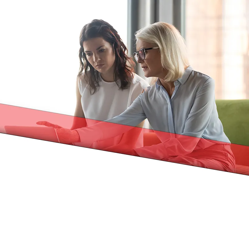 loutel llc law banner mobile A female attorney meeting with her client to discuss information.